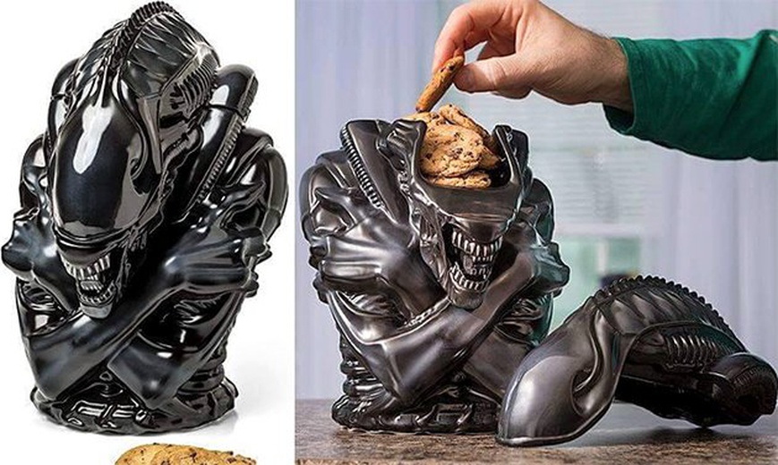 alien cookie jar defeats predator godzilla spider man captain