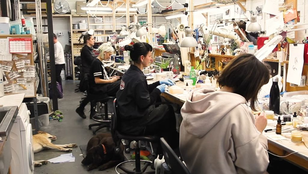Inside the puppet workshop.&nbsp;&nbsp;Please note the requisite dogs snoozing on the shop floor.&nbsp;&nbsp;Image courtesy Fox Searchlight.