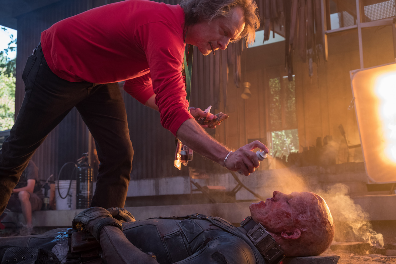 Bill Corso adds a little shine to&nbsp;Ryan Reynolds as Deadpool on the set of Deadpool 2. Photo Credit: Joe Lederer. Courtesy 20th Century Fox.