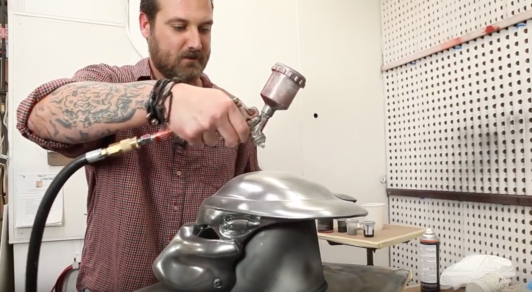 For the clear coating, Jamie works in light passes, building the desired sheen.