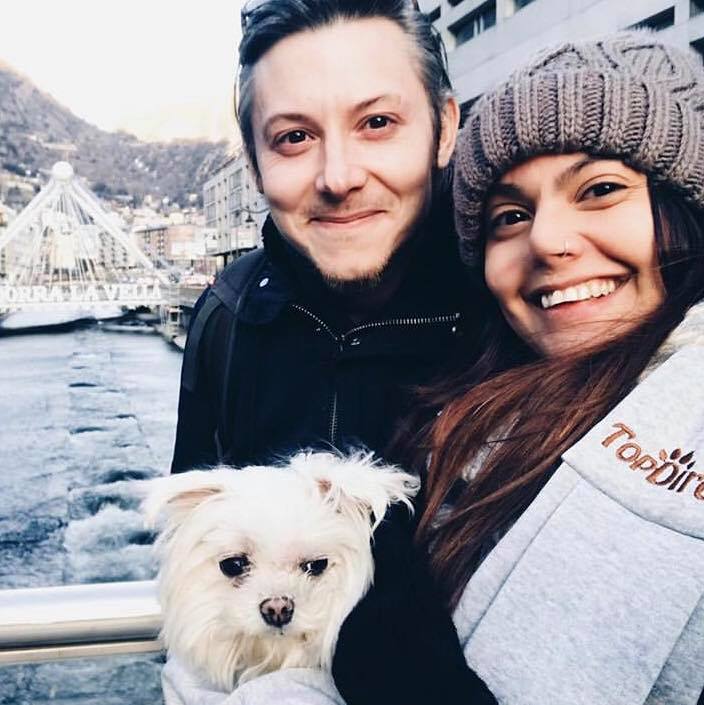 omas McAdam with his wife, Fernanda, and their dog.