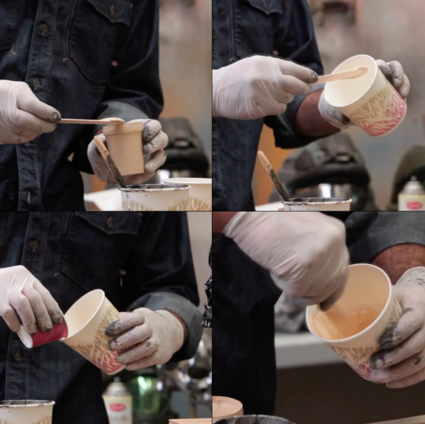 Rob Ramsdell mixes paint.