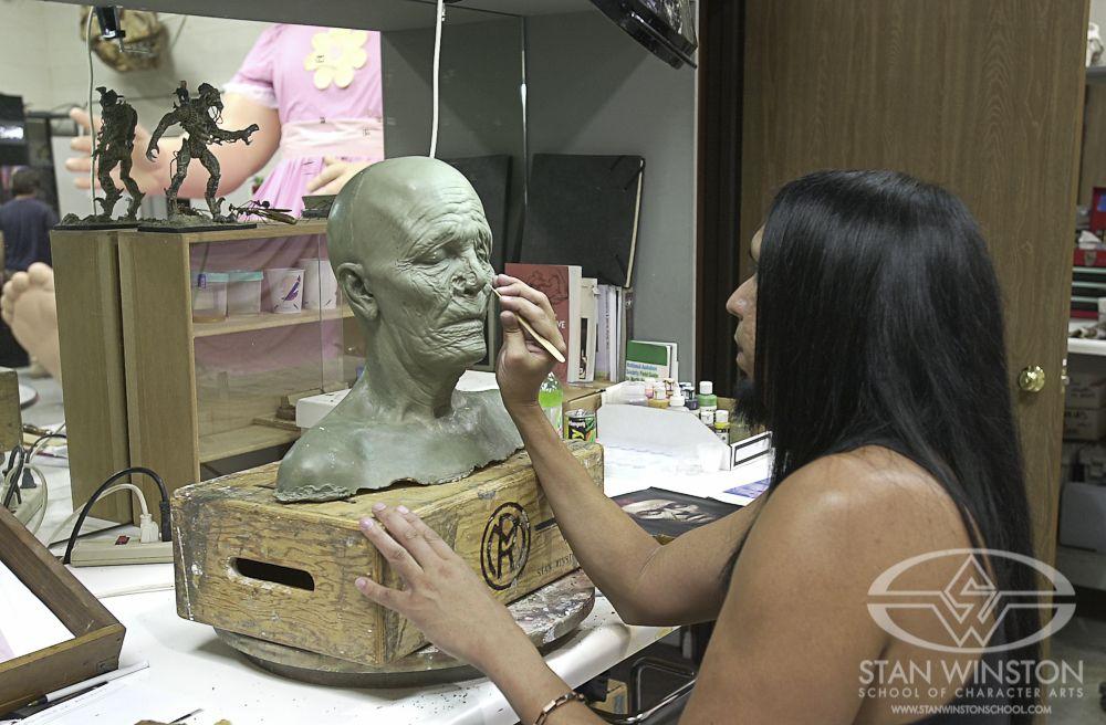 SWS artist Joey Orosco sculpts a prosthetic makeup for actress Barbara Pilavin. Forensic photos of a three-week-old corpse were used for reference.