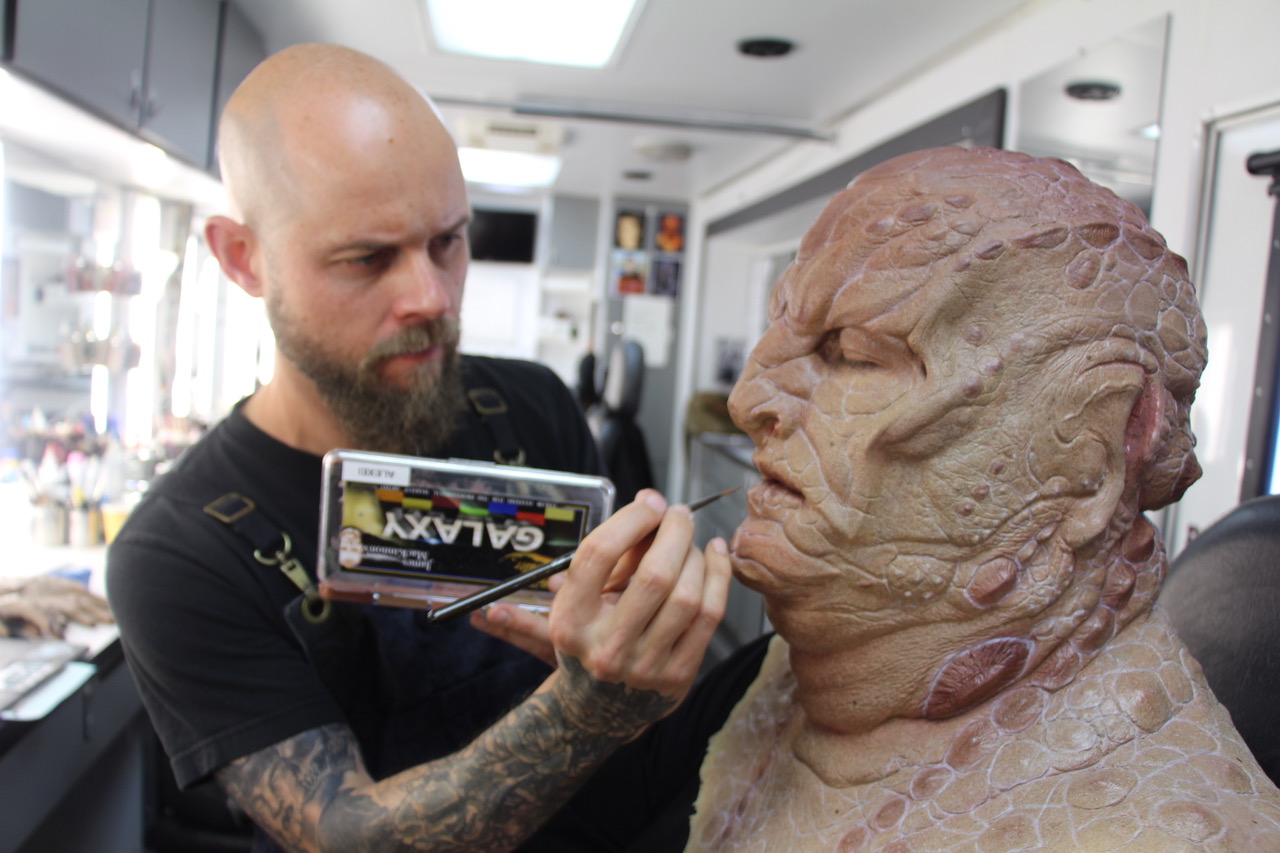 Key Makeup Artist&nbsp;Alexei Dmitriew adds paint detail to actor Dominic Burgess as Mr. Vup.&nbsp; Image&nbsp;courtesy&nbsp;James MacKinnon/CBS All Access.