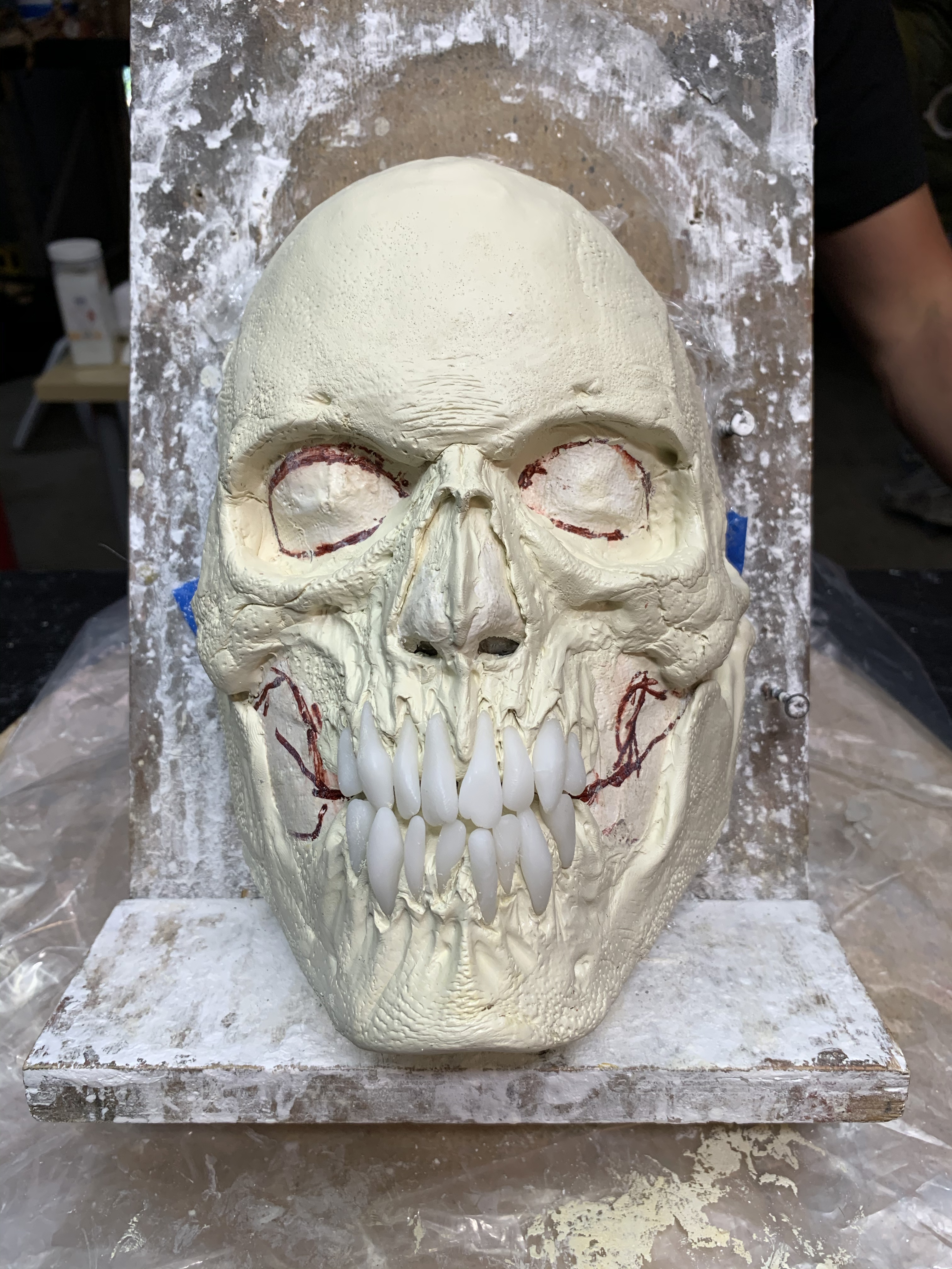Ready for paint after adding translucent thermoplastic teeth to the epoxy clay sculpture.