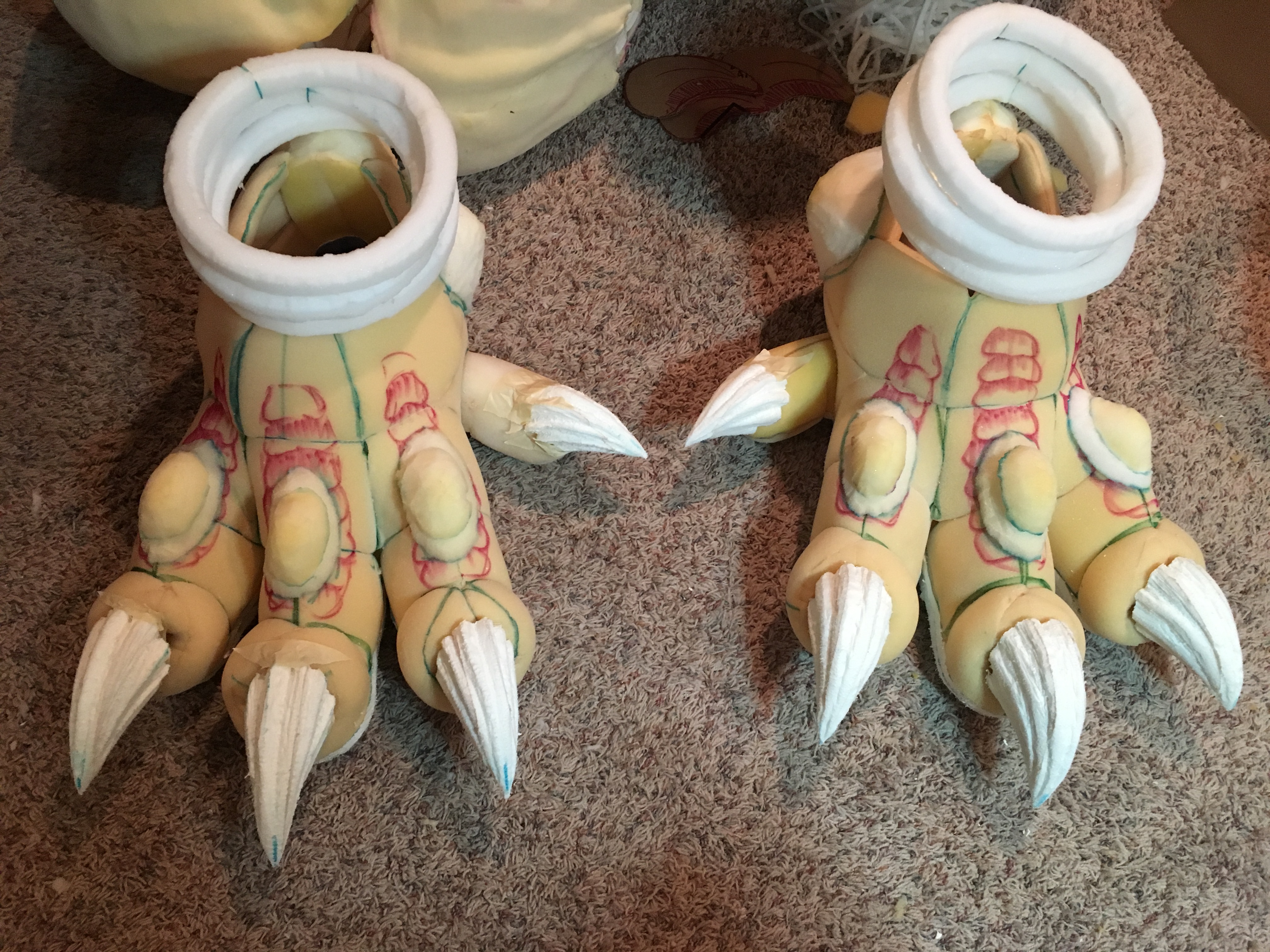 The work-in-progress feet of Fusion Godzilla showing the carved toes and built-up foam.