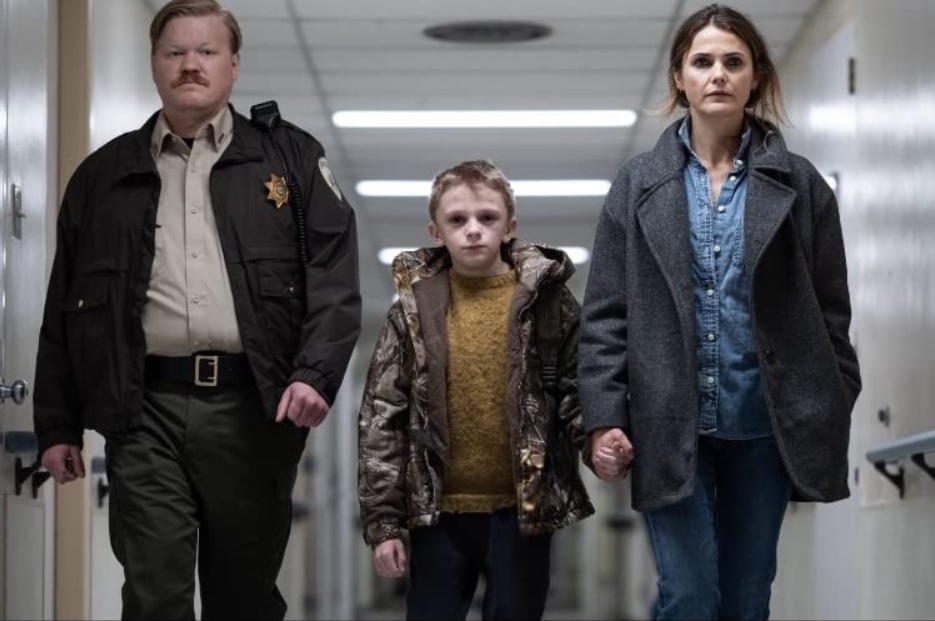 Sheriff Meadows Jesse Plemons, young Lucas Jeremy T. Thomas, and Julia Meadows Keri Russell form an unlikely family unit in Antlers. Image courtesy Fox Searchlight