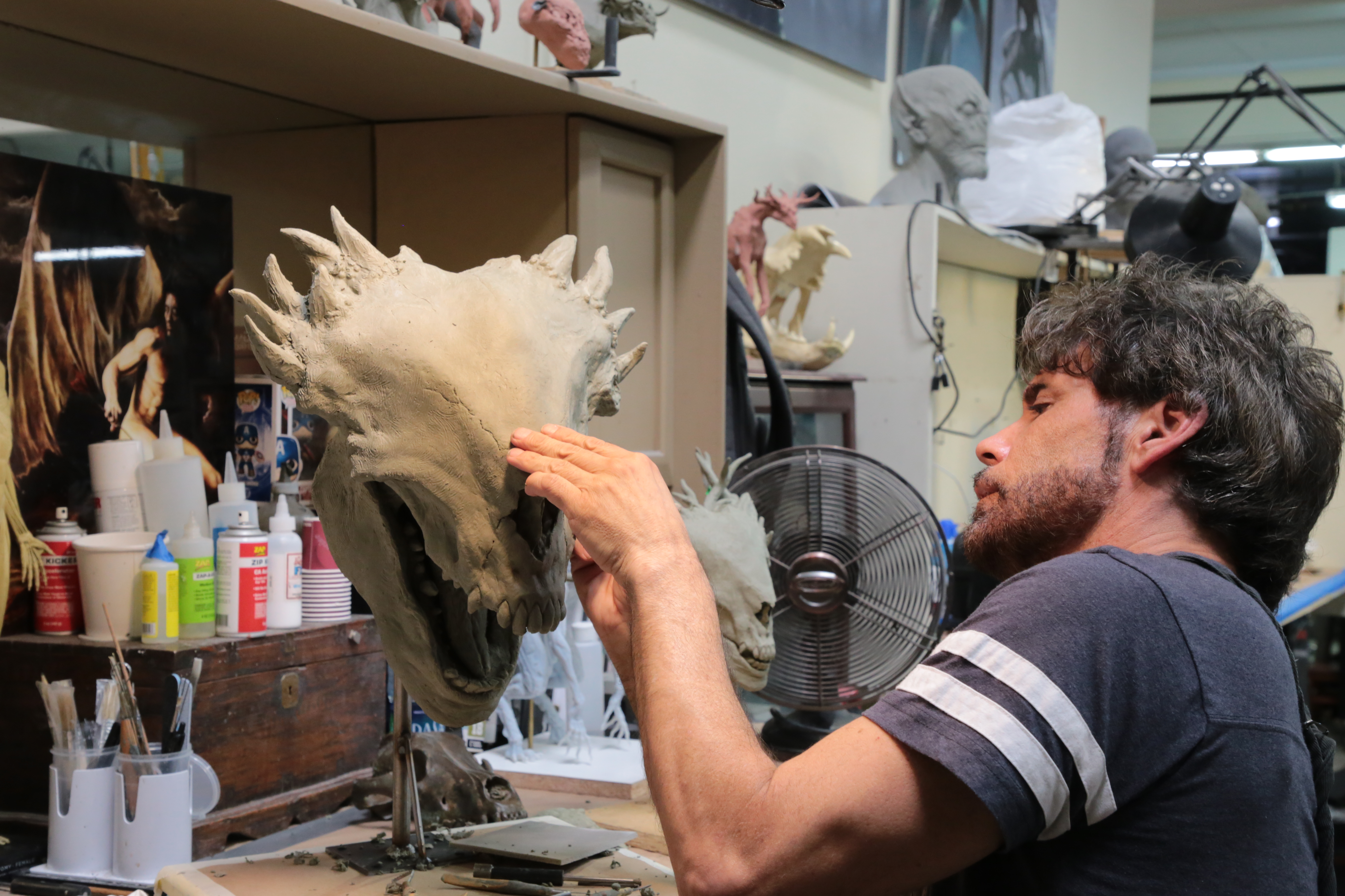 Christopher Swift works on the Wendigo full-size head sculpture. Image courtesy Legacy Effects/Fox Searchlight.