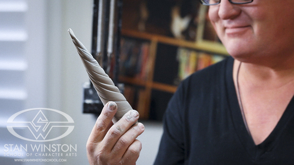 Don regards his horn which could serve just as well as a tail or tentacle.