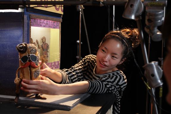 Director Lisha Tan positioning one of the delightful characters she designed.