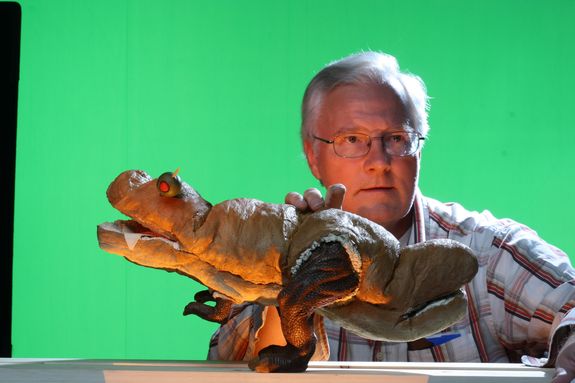 The author, Mark Sawicki, with the final Breadwich, ensures the lighting is just right. The green screen was 15 feet away to make sure there was no green spill light on the monster.