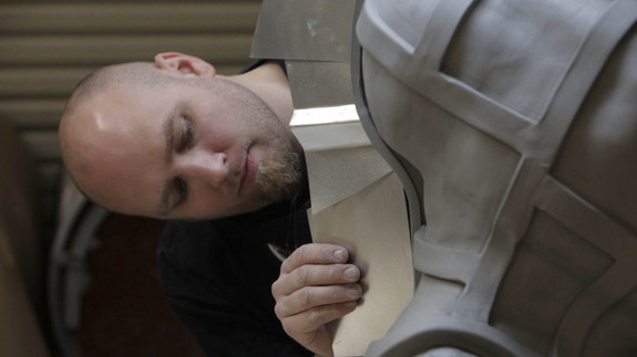 Timothy Martin creates the two-piece mold by setting shims down a centerline in the clay in this Matrix mold.