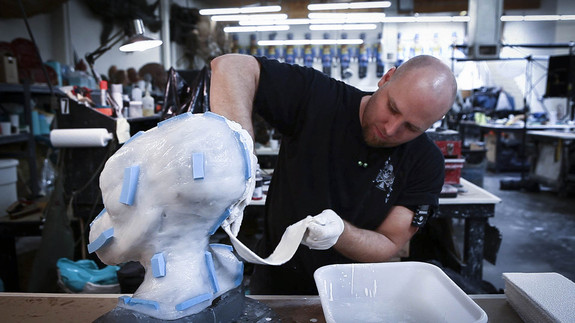 Tim creates the hard outer shell on this silicone brush up by using a plaster bandage.