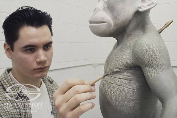 Jason Matthews sculpts the toddler mountain gorilla.
