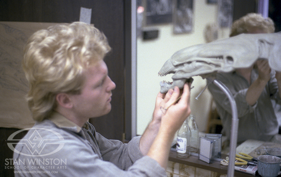 Shane Mahan affixes the lower jaw to the Alien Queen head sculpture.