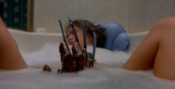 Nancy (Heather Langenkamp) falls asleep in the bathtub.
