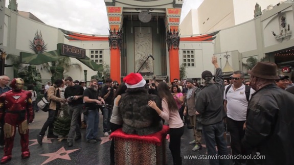 Amalgamated Dynamics co-founder Alec Gillis puppeteers Santa Gorilla outside the famous Chinese Theater on Hollywood Blvd.