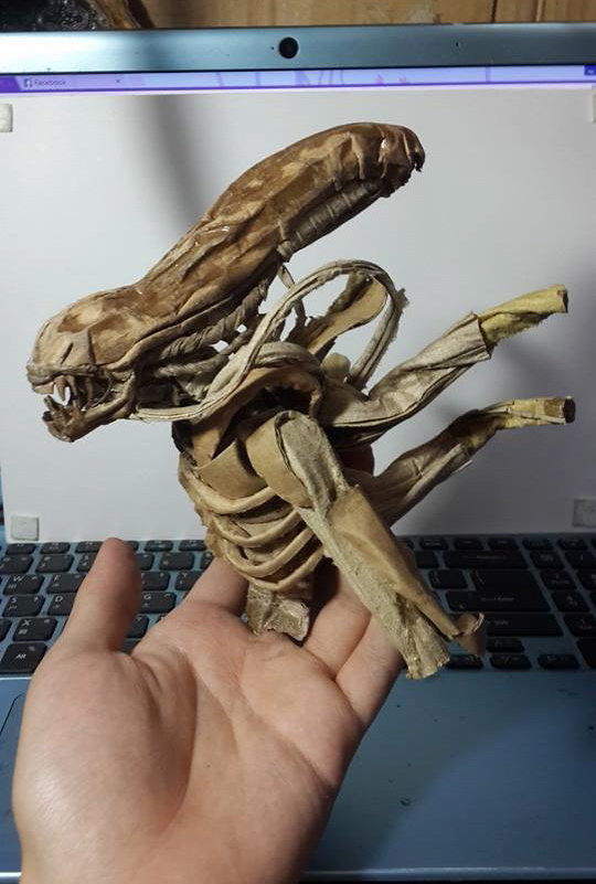 Xhongkai encourages people to make what they love, using the materials they have on hand. &nbsp;You don't need a lot of money to make a cardboard Alien Doorknocker.