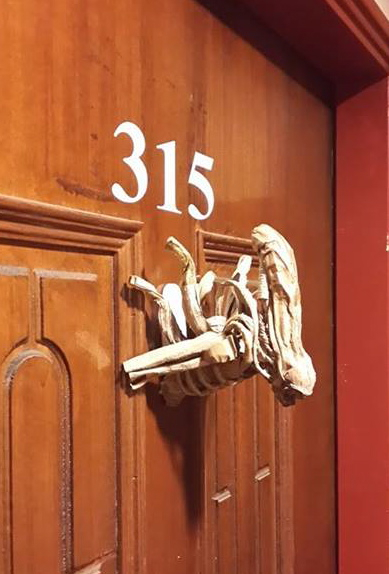 Xhongkai encourages people to make what they love, using the materials they have on hand. &nbsp;You don't need a lot of money to make a cardboard Alien Doorknocker.