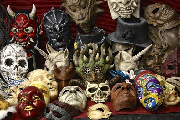 A menagerie of masks by Mark Andrew Schneider.