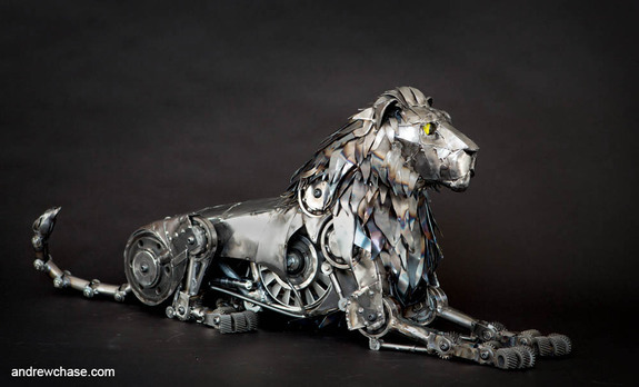 Metal lion sculpture from recycled transmission parts by Andrew Chase.