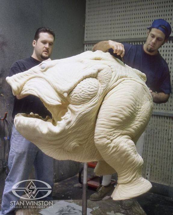 revor Hensley and Rob Ramsdell prepare to paint the Pig Lizard.