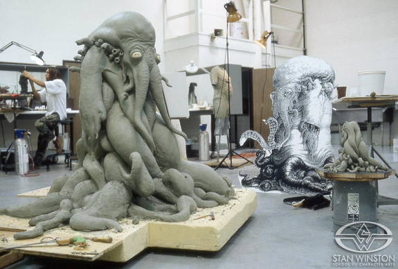 Nearly finished clay sculpture based on the concept art and maquette (visible on the right side)