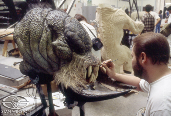 Richard Davison paints Kothoga's fangs.