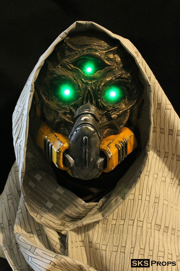 Destiny Hunter Exotic Cosplay Mask of the Third Man by Steven K Smith (aka SKS Props). This is even more detailed than the actual game model. The mask is resin cast. Green LEDs are installed in each eye socket.