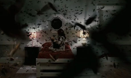 Hundreds of bats fly around Em’s room.