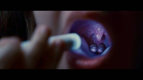 Em makes a terrible discovery upon looking down her throat.