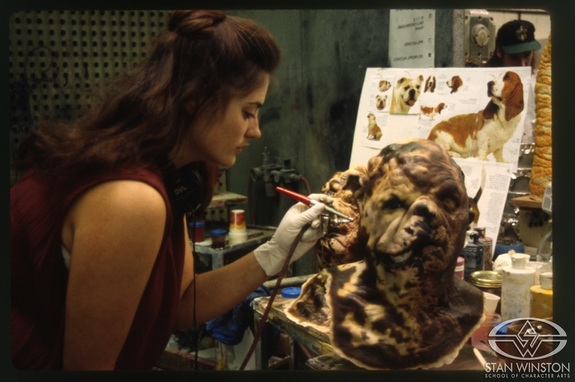 Beth A. Hathaway airbrushes one of the 150 “beast-people” created by Stan Winston Studio for The Island of Dr. Moreau.