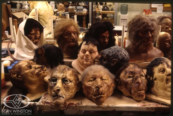 An assembly of completed “beast-people” masks created by Stan Winston Studio for The Island of Dr. Moreau.