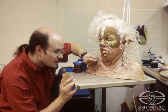 Bruce Spaulding Fuller works on the Sow-lady makeup at Stan Winston Studio.