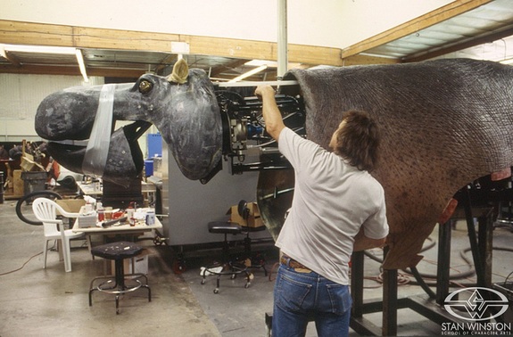 Paul Romer works on the mechanical interior of Congo's full-size animatronic hippopotamus.