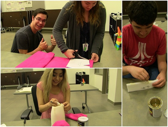 It's all about teamwork! Students help each other to create their first puppet.