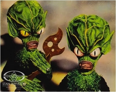 Two of the green alien antagonists from Roger Corman's Invasion of the Saucer-Men.
