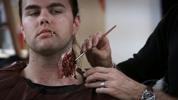 Our man Chris is our victim today. He gets prepped for a nice chunk to be 'bitten' right out of him.
