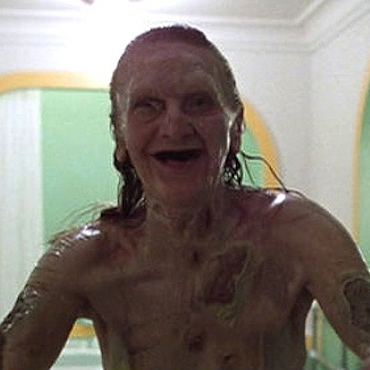 The terrors of The Shining's Overlook Hotel include the dead twins and the woman from Room 237.