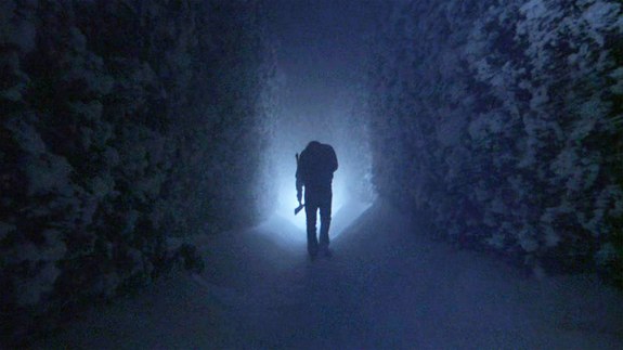 Jack (Jack Nicholson) stalks his son Danny through the snowy labyrinth of the Overlook Hotel's hedge maze.