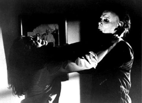 Laurie Strode (Jamie Lee Curtis) struggles with “The Shape” aka Michael Myers in Halloween.