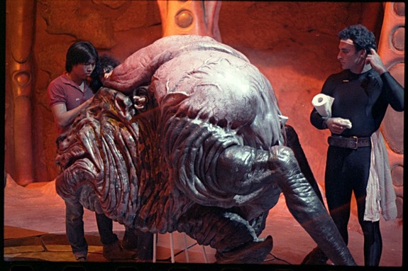 Steve Wang on the set of Invaders From Mars painting one of the brain drones.