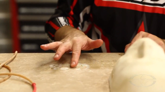 After the brushed latex is set, Gary peels, pulls, folds, and rolls the dried rubber into an organic, blistery mesh.