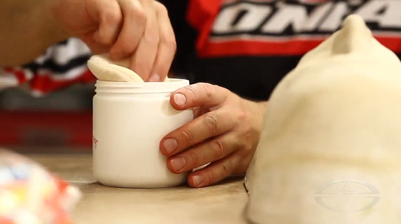 As the nurney forms, Gary pats it down with powder to keep it manageable to handle.